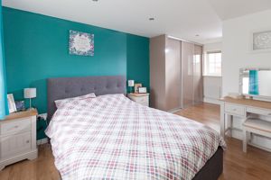 Bedroom One- click for photo gallery